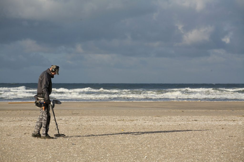 How does a metal detector function?